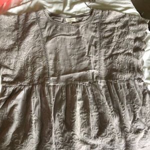 Loose-fitting grey eyelet top
